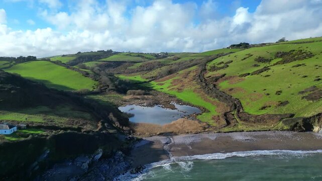 Man Sands, South Devon, England: DRONE VIEWS: A secluded beach on the South Devon coast just south of Brixham. The lagoon behind the beach is a haven for birds and grass snakes.