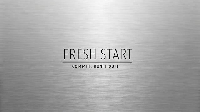 Metallic background with etched fresh start message