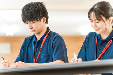 Care workers and care manager helpers undergoing training (study group, meeting) © buritora
