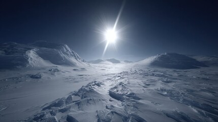 Vast Frozen Tundra Under a Bright Sunlit Sky with Snowy Mountains