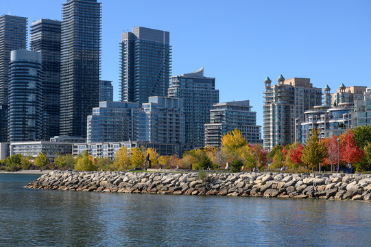 Etobicoke waterfront skyline featuring modern high-rise apartments during autumn