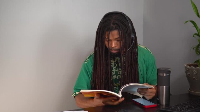 African American Naturopathic Doctor Researching at Desk