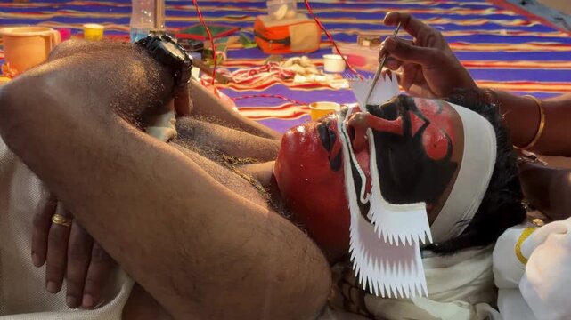 Rare kathakali artist preparing for performance