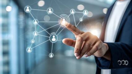 Businessman interacting with digital network interface in office