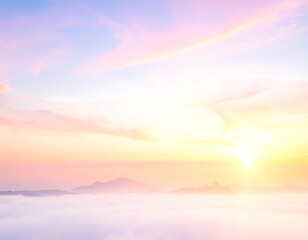 Dreamy pastel sunrise over mountains and clouds; vibrant colors illuminate sky
