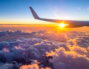 Airplane wing, golden sunrise over fluffy clouds from a high altitude