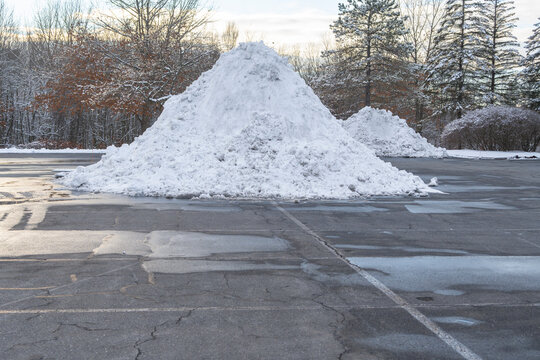 snow pile on the parking lots after snow storm