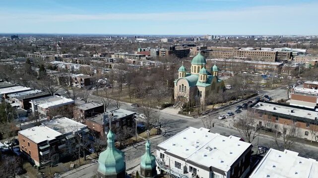 Aerial view of Assumption of the Blessed Virgin Mary Catholic Church in Montreal on a clear winter day. g.