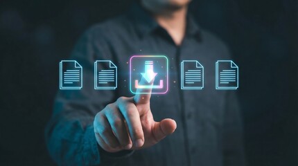 A man interacts with a digital file transfer interface in a dark room, symbolizing modern technology and data management solutions for businesses and professionals.