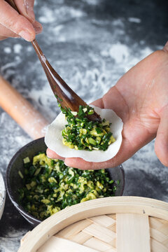 Spoon Filling Placed On Dumpling Wrapper