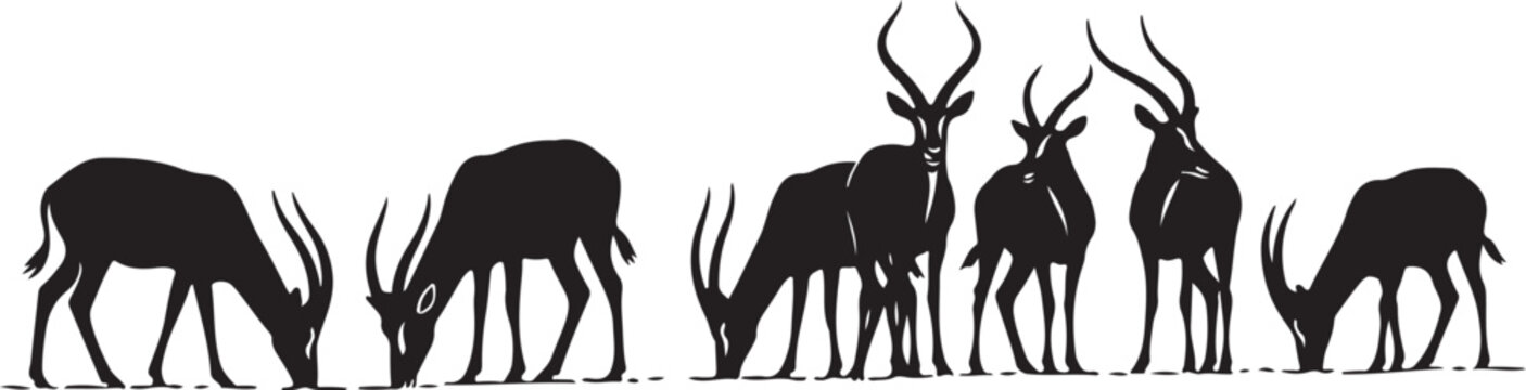 Silhouette of deer grazing in a peaceful natural setting together