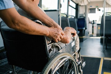 Elderly Man in Wheelchair Assisted onto Public Bus by Kind Helper with disabled, bus, wheelchair, man, accessibility, senior, elderly