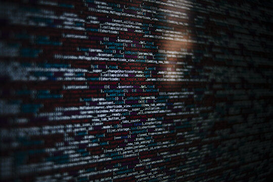 Abstract closeup of multicolored programming code lines on a dark screen, symbolizing complex software systems, cybersecurity, and the hidden logic powering modern digital technology

 - Powered by Adobe