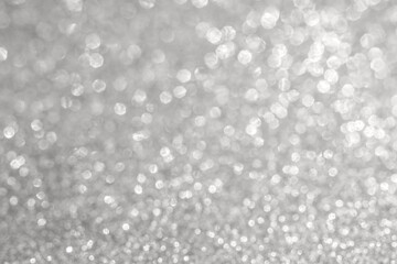 Abstract silver glitter sparkle texture with bokeh background