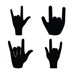 Obraz premium Collection of four black hand silhouettes depicting the iconic rock and roll sign against a white background