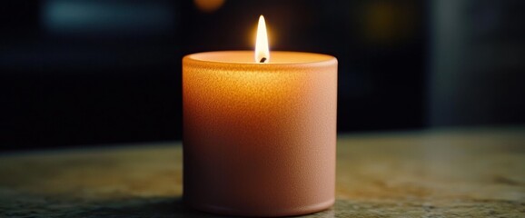 A stylish LED candle flickering with realistic warm glow