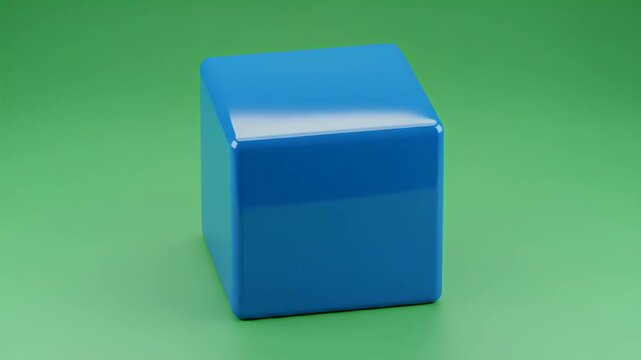 Blue Cube Centered on Green Background Loop Simple Geometric Footage