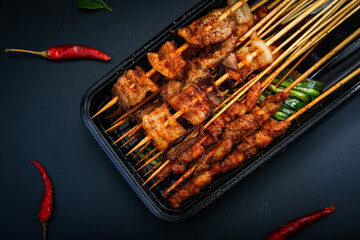 Grilled Lamb Skewers And Cumin Beef On Black
