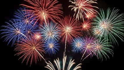 Vibrant Multi-Colored Fireworks Display Bursting in the Dark Night Sky for Celebration