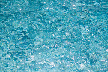 Obraz premium Water with abstract texture. Water on blue background. Water with gentle wave. Water in pure sea.