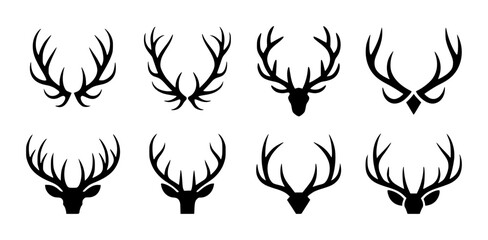 Naklejka premium Collection of black deer antlers and heads silhouettes white background