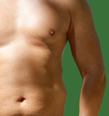 Fototapeta premium A man with a green background. His chest is bare.