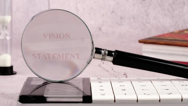 A magnifying glass focuses on a Vision Statement, revealing clarity and direction. A serene atmosphere is emphasized with a nearby hourglass and book