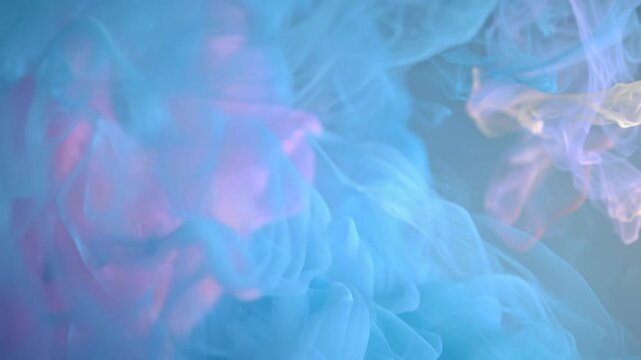 Soft Turquoise and Pink Hues in Abstract Fabric Background