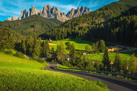 Amazing Funes valley with green fields and spectacular cliffs, Dolomites