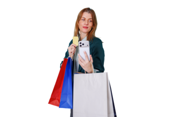 Woman holding phone and credit card, carrying shopping bags, making online payment or showing purchase success