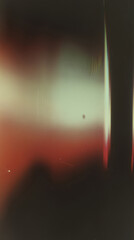 Abstract retro scanner texture with red light leak, soft gradient fade, glitch distortion, and vintage film noise.