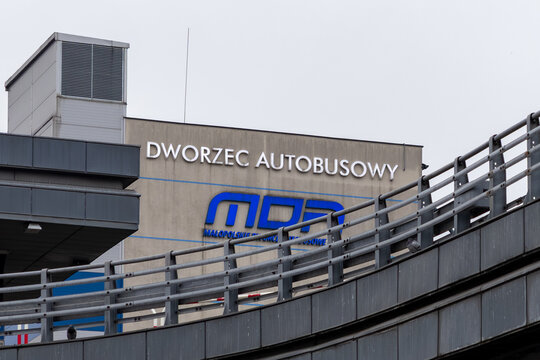 Krakow, Poland - December 1, 2025: MPK Malopolskie Bus Station, modern concrete building displaying blue logo, an urban public transport hub