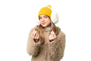 Young girl wearing winter muffs over isolated chroma key background making money gesture