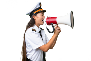 Airplane pilot Asian woman over isolated background shouting through a megaphone