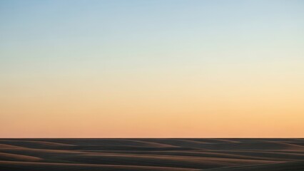 Vast Horizon Under a Soft Gradient Sky at Dusk.