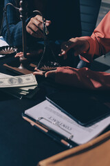 Fototapeta premium Consultation and conference of professional businesswoman and Male lawyers working and discussion having at law firm in office. Concepts of law, Judge gavel with scales of justice