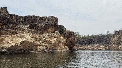 Beautiful marble mountains or Marble rocks on the banks of river Narmada at Bhedaghat in Jabalpur Madhya Pradesh india