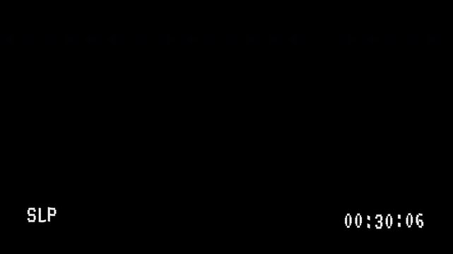 A nostalgic screen display with 'PAUSE II' and 'SLP' text, distinctly showing the vintage experience of pausing VHS video 4k