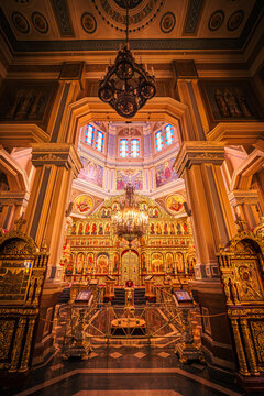 Interior view of the Patriarchal Cathedral of the Holy Ascension in Almaty, Kazakhstan, showcasing its breathtakingly colorful and artistic altar