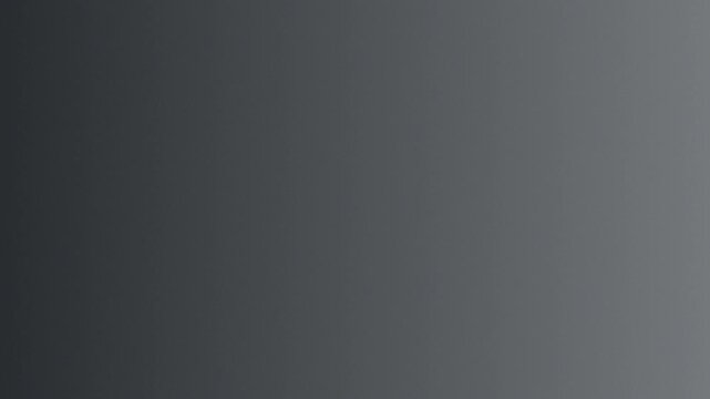 Smooth and soft gray gradient background offering a versatile digital canvas with subtle tonal variations for modern design projects and high-quality presentations