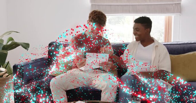 Left man sorting mail for finance, confetti floating as right man pointing, showing black object