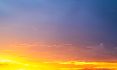 Fototapeta premium Sky sunset evening sunrise cloud weather dramatic landscape goldent and indigo color gradient pastel horizon, twilight yellow golden reflection morning nature environment energy ecosystem change