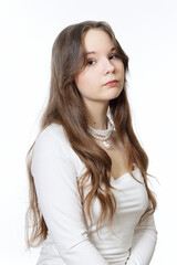 Portrait of a beautiful young girl wearing pearl jewelry