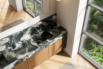 Modern interior top view of bathroom sink with marble countertop and wooden cabinets near large...