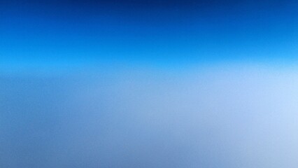 Fototapeta premium Inversion weather with low clouds and clear blue sky, aerial drone view over Northern Moravia. Atmospheric weather background showing winter climate and temperature inversion.