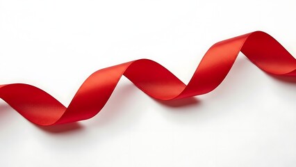 Red ribbon curled and twisted on white background