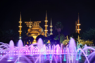 night view of blue mosque and it is written No orphan should be left without protection.