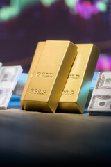 Gold Bars and Cash with Stock Market Background