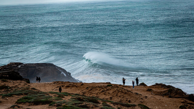 the biggest swell of the year hitting the coast line near Imsouane, Morocco wit +10m wave smashing into the rocks and shooting spray 50m in the air.