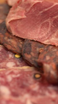 Traditional Italian charcuterie board with assorted cured meats and rustic presentation